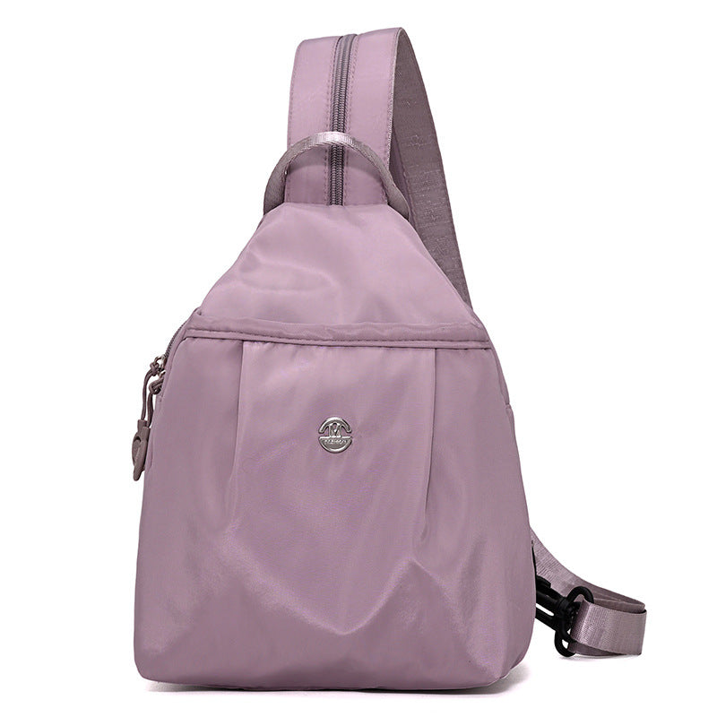 Sling Backpack with Adjustable Strap and Multiple Zippered Compartments