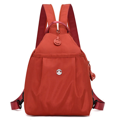 Sling Backpack with Adjustable Strap and Multiple Zippered Compartments