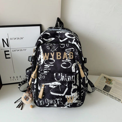 Graffiti Print Backpack with Padded Laptop Sleeve and Weather Resistant Fabric